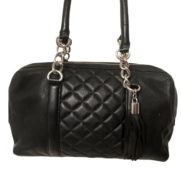 Calvin Klein Handbags - Calvin Klein quilted black leather barrel bag